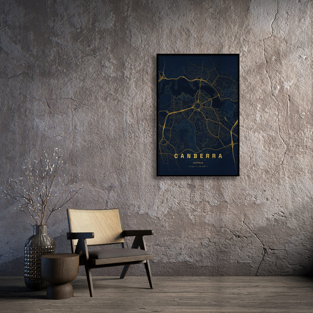 A minimalist city map of Canberra, Australia, featuring a luxurious gold-on-navy blue color scheme. The design highlights the geometric circular road layouts and Lake Burley Griffin, with the city name and geographic coordinates printed at the bottom in gold typography.